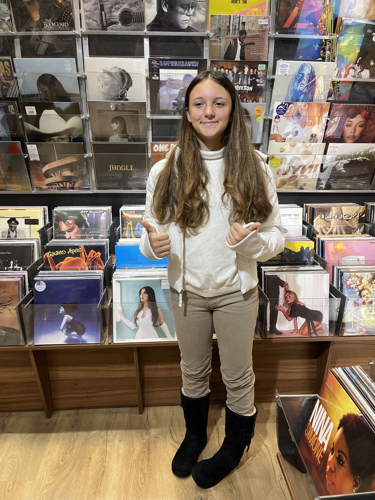 Ruby giving a thumbs-up in a Sofia record shop